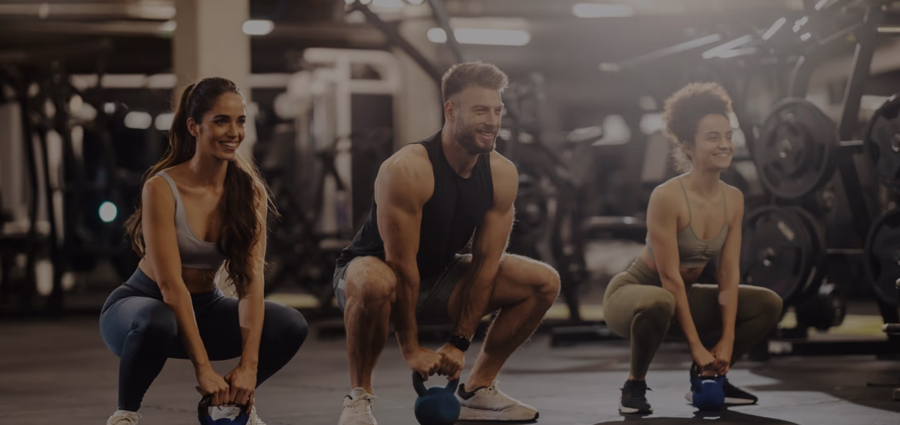 3 people working out in the gym